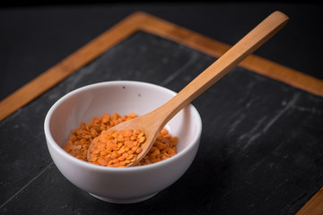 Red lentils in a white bowl