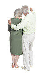 Portrait of senior couple posing isolated on white background