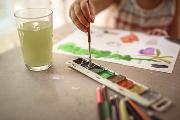 Obraz na płótnie Canvas child draw close-up, lifestyle in real interior