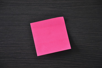 Sticker on wooden wall close-up 