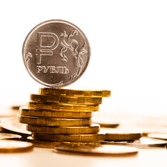 The Russian rouble coin and gold coins