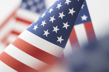 American Flag Close Up shot shallow depth of field. Stars and Stripes Flag printed on paper.