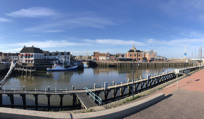 Fototapeta premium Panorama from the oude buitenhaven a canal in Harlingen