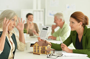 Portrait of working business people in office