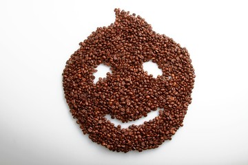 Coffee beans in the shape of a smiley face