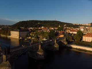Fototapeta na wymiar aerial view on sunrise of charles bridge in prague