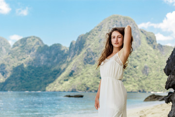 Beautiful amazing nature background. Tropical blue sun sea in Philippines . Luxury holiday resort. Island coral reef. Fresh freedom. Adventure day. Coconut paradise. Woman has long dress