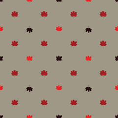 Seamless pattern with autumn maple leaves.  Red, black and scarlet leaves on light brown background. Vector illustration