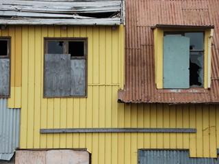 Fototapeta na wymiar Spooky Yellow Condemned Building ready for Demolition