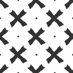 Obraz premium Repeated round spots and crosses drawn by hand with rough brush. Simple seamless pattern. Sketch, grunge, watercolor, paint.