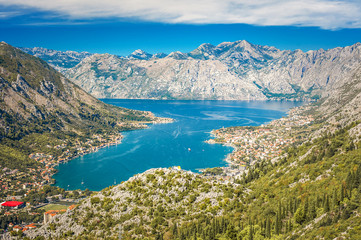 Sea coastline, view to the city surrounded by mountains