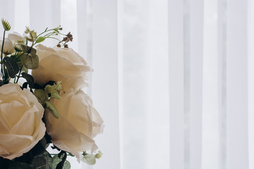 Bouquet of white flowers on a white background