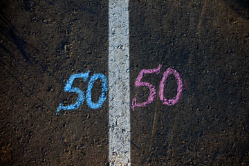 gender symbol on asphalt, gender concept