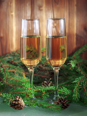Two glasses of champagne. Christmas background. Merry Christmas. Holidays and birthdays.