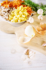 chopped onion and ingredients for soup