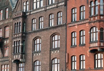 Traditional facade of buildings, exterior Close-up of beautiful historic buildings standing tightly together