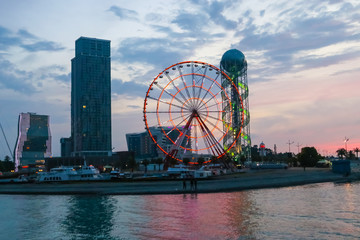 Batumi, Adjara, Georgia. View from the sea on illuminated resort town at evening