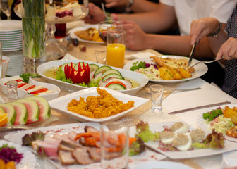 A table with food and drinks at party