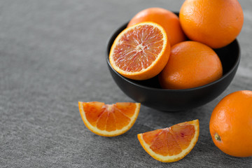 food, fruits and healthy eating concept -close up of fresh juicy blood oranges