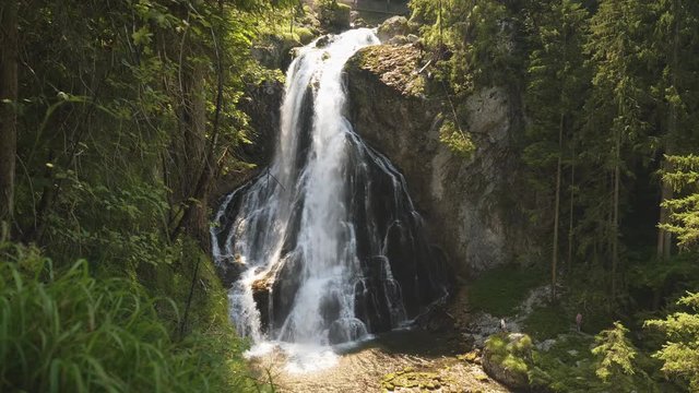 Salzburgerland Austria, Waterfall streaming from cliff Gollinger Waterfall