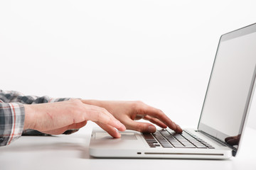 Laptop with man hand isolated on white background