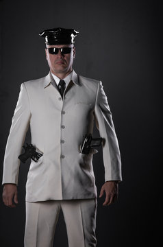 security agent in white suit