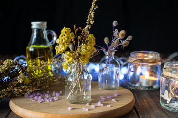 Obraz na płótnie Canvas Aroma herbs in bottles