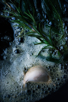 Garlic cooked in butter and herbs.