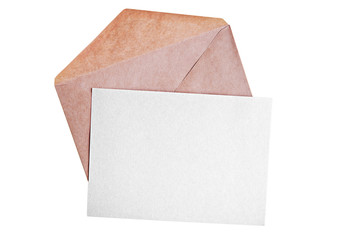 Blank paper card and open envelope on yellow wooden background