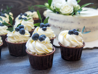 Biscuit cakes with blueberry and flowers