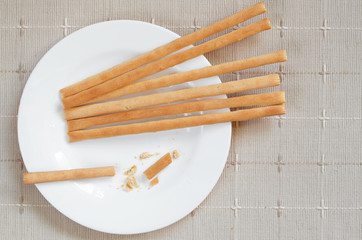 Bread sticks on a plate