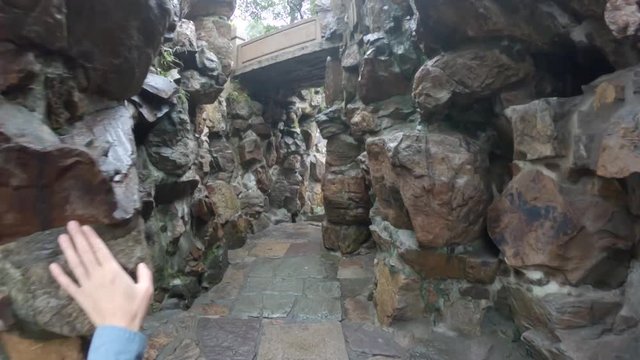 Walking through stone pathway in Shanghai, POV