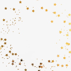 Festive background. Shining stars on white background. Christmas. Wedding. Birthday. Happy woman's day. Mothers Day. Valentine's Day. Flat lay, top view, copy space. 