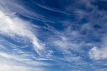 Plumose clouds in the blue sky