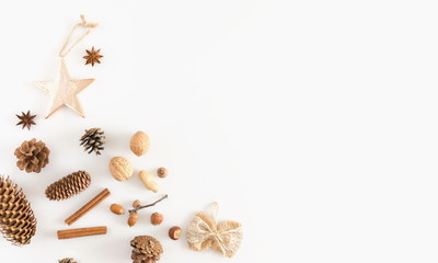 Christmas composition. Cinnamon sticks, anise star, cones, nuts, acorn. Christmas, winter, new year concept. Flat lay, top view, copy space 