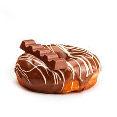 Donut with milk chocolate glaze and chocolate, isolated on white background. View from side.