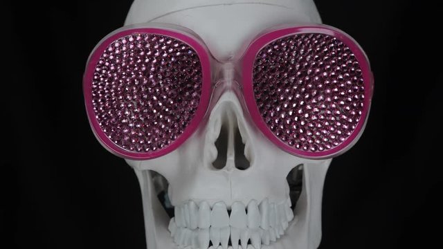 skull wearing sparkling sunglasses