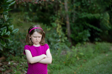 Sullen Little Girl With Attitude Outside