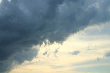 A large gray rain cloud. Background. Landscape.