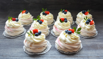 cakes with blueberries and strawberry