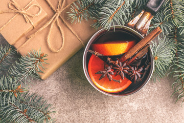 Hot mulled wine in a small vintage pan