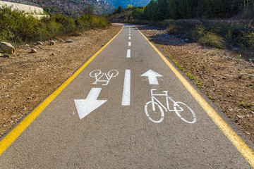 Bicycle sign on the road used for pedestrian crossing