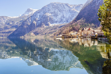 Fototapeta na wymiar Spectacular view on Hallstatt village reflecting in mountain lake