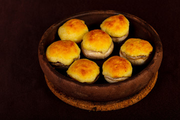 Baked champignons mushroom with cheese