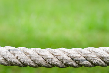 Close Up rope against green nature background with copy space