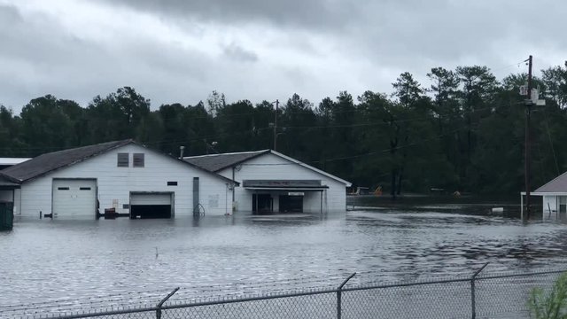 Flooded warehouses and houses in North Carolina