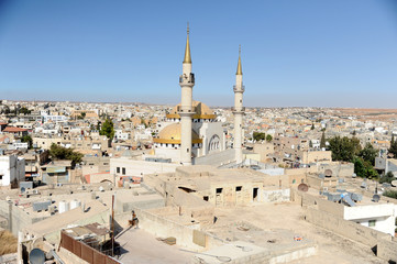 Madaba, Jordan, September 30th 2018: Panoramic photo of the southwestern part of Madaba with the mosque in the foreground