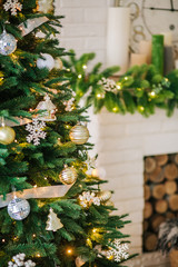 Fototapeta na wymiar Christmas decorations garland tree home interior