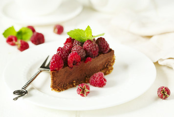 Chocolate cake with fresh raspberry.
