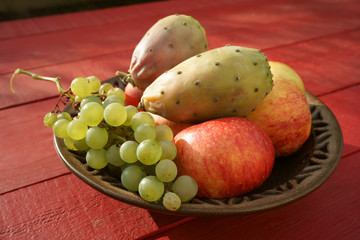Plate cactus fruits apples grapes